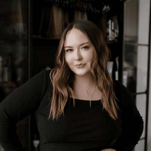 Portrait of Riley Kroll, a professional stylist at Wisp Salon, showcasing their expertise and style.