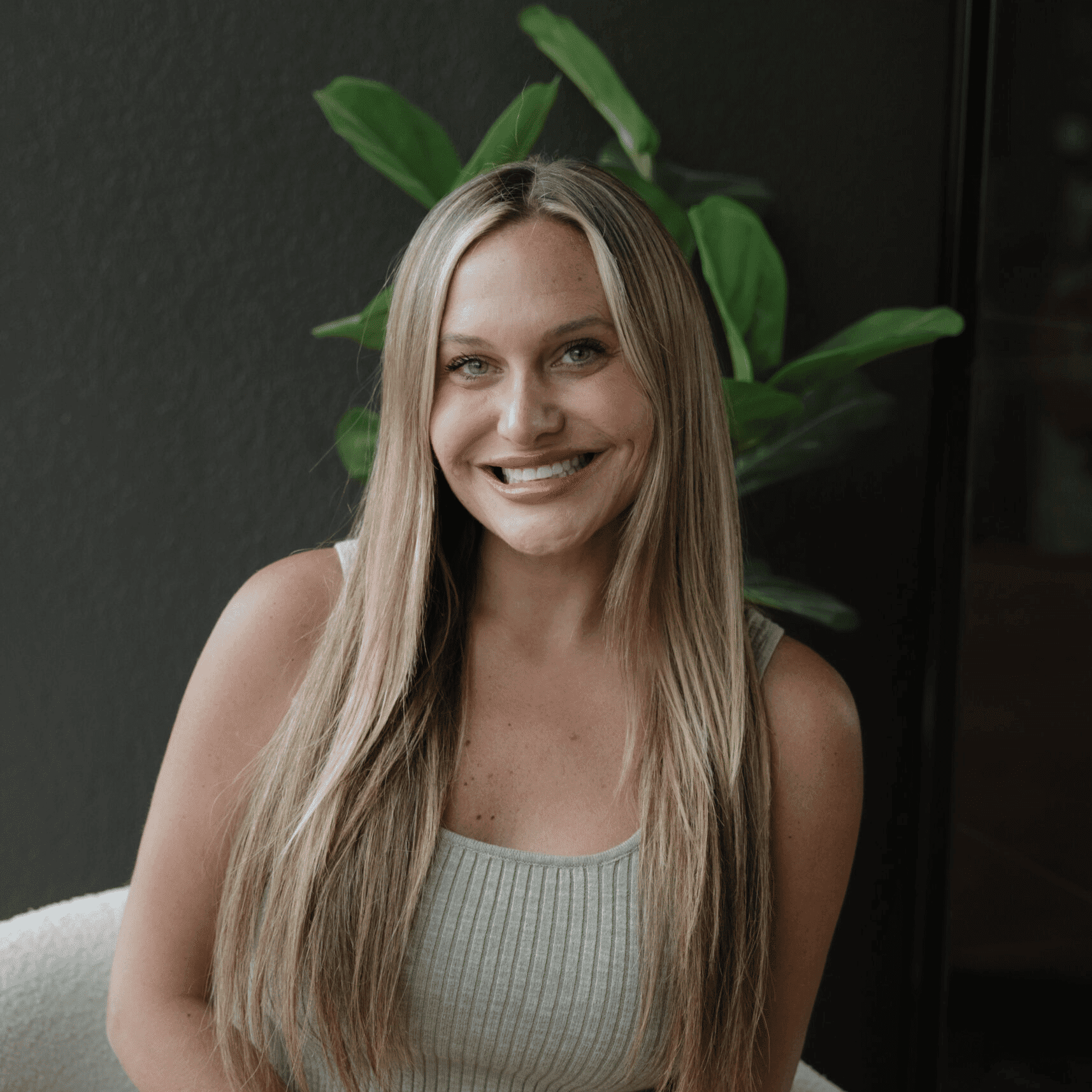 Portrait of Lauren Stanfield, a professional stylist at Wisp Salon, showcasing their expertise and style.