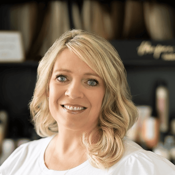 Portrait of Shannon Latino, a professional stylist at Wisp Salon, showcasing their expertise and style.