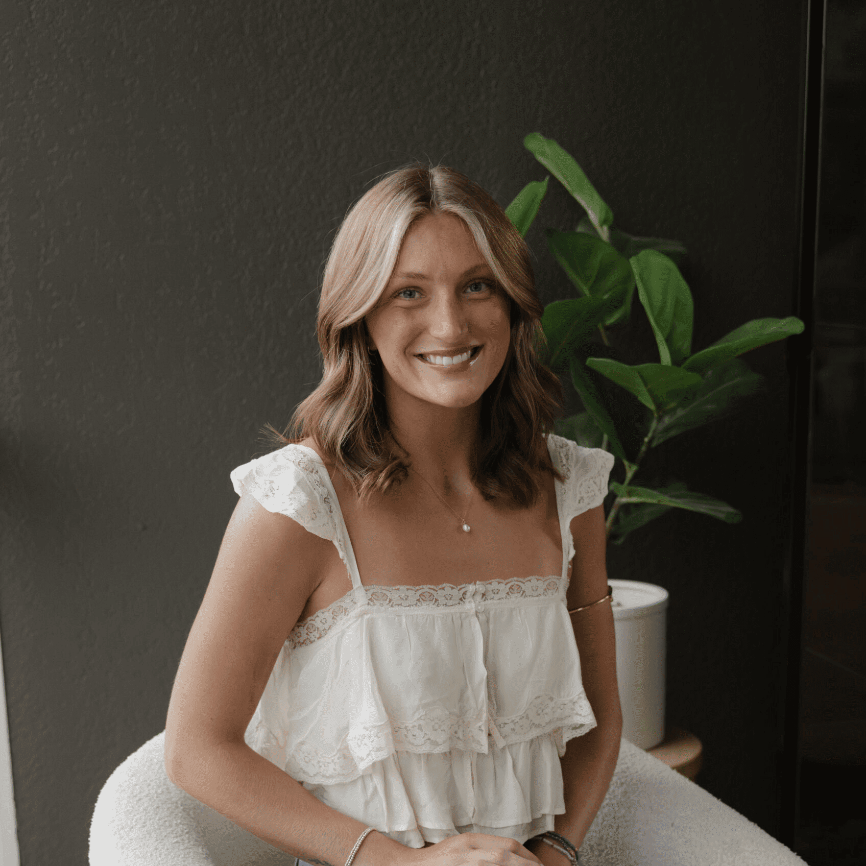 Portrait of Nicole VanderHeiden, a professional stylist at Wisp Salon, showcasing their expertise and style.