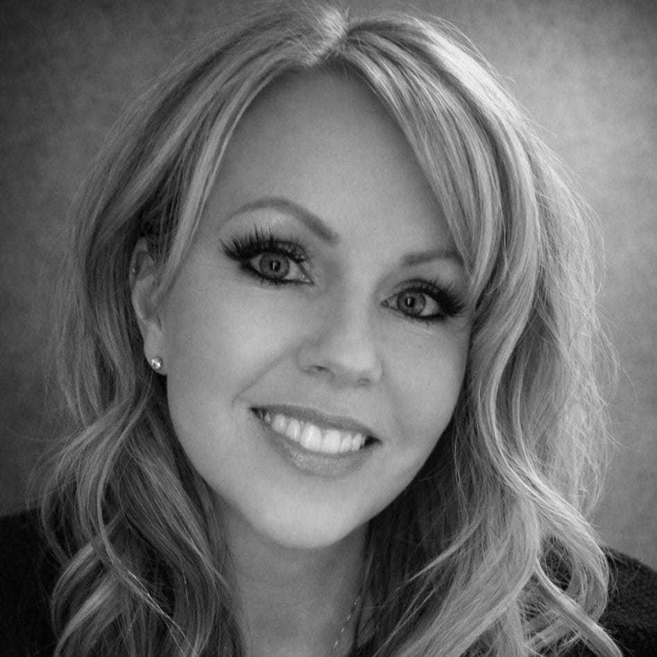 Portrait of Audra Guerrero, a professional stylist at Wisp Salon, showcasing their expertise and style.